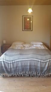 Postel nebo postele na pokoji v ubytování Litlabjarg Guesthouse