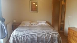 Postel nebo postele na pokoji v ubytování Litlabjarg Guesthouse