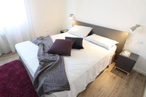 Ένα ή περισσότερα κρεβάτια σε δωμάτιο στο casa Ginepro +32 φωτογραφίες