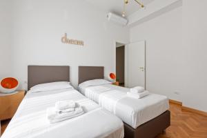 Posteľ alebo postele v izbe v ubytovaní GuestHost - Porta Vittoria Central Apartment