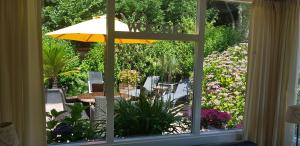 Zahrada ubytování Vakantiewoning "Aan het Bosje" ZOUTELANDE - Strand 200m ! + 15 fotografií