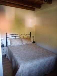 Un pat sau paturi într-o cameră la Valle del sol II