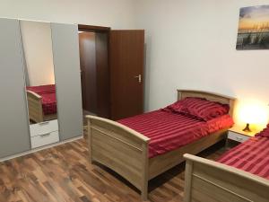 Ein Bett oder Betten in einem Zimmer der Unterkunft Wagner Ferien Apartments