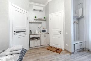 Kuchyňa alebo kuchynka v ubytovaní Golden Rose ! Apartments Lviv