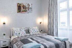 Posteľ alebo postele v izbe v ubytovaní Golden Rose ! Apartments Lviv