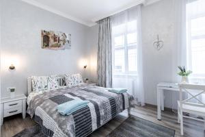 Posteľ alebo postele v izbe v ubytovaní Golden Rose ! Apartments Lviv