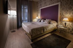 Säng eller sängar i ett rum på Zanhotel Europa
