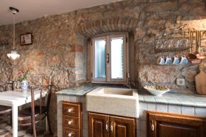 Kuchyň nebo kuchyňský kout v ubytování Holiday Home Bozanić