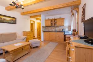 Kuchyň nebo kuchyňský kout v ubytování Valašské chalupy Resort