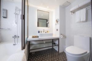 Ένα μπάνιο στο City Suites - Main Station