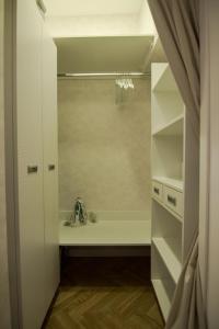 a bathroom with a sink and a mirror at Studio Stil in Belgrade