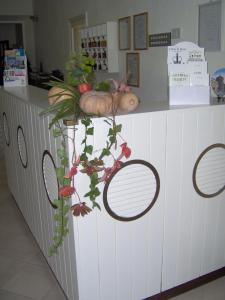 a counter with some vegetables on top of it at Hotel Signorini in Castiglioncello