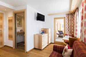 TV a/nebo společenská místnost v ubytování Hotel Anemone