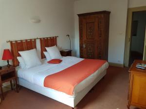 Łóżko lub łóżka w pokoju w obiekcie L'Auberge du Brand