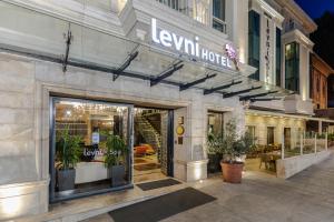 a store front of a building with a sign on it at Levni Hotel & SPA - Special Category in Istanbul