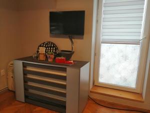 Kuchyň nebo kuchyňský kout v ubytování Apartman Red wall