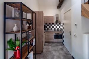 Kuchyň nebo kuchyňský kout v ubytování De Stal