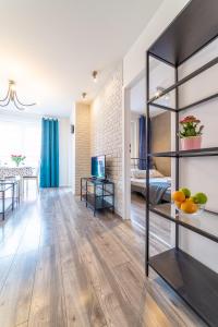 Posteľ alebo postele v izbe v ubytovaní Apartament Sobieskiego 2a Parking gratiss