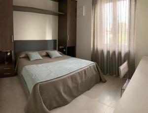 Voodi või voodid majutusasutuse B&b estercarlo toas
