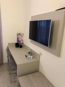 Televiisor ja/või meelelahutuskeskus majutusasutuses B&b estercarlo