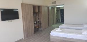 Voodi või voodid majutusasutuse Cross Health Spa Center toas