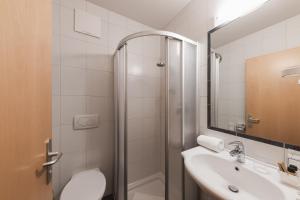 Koupelna v ubytování Hotel Kesslwirt