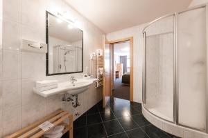 Koupelna v ubytování Hotel Kesslwirt