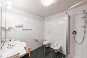 Koupelna v ubytování Hotel Kesslwirt