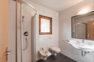 Koupelna v ubytování Hotel Kesslwirt