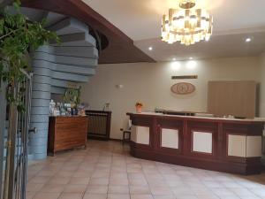 a large room with a counter and a counter at Hotel San Lorenzo in Pozzolengo