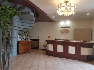 a large room with a counter and a counter at Hotel San Lorenzo in Pozzolengo +90 photos