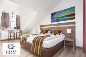 Voodi või voodid majutusasutuse Hotel Duus by Keflavik Airport toas