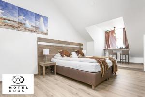 Voodi või voodid majutusasutuse Hotel Duus by Keflavik Airport toas