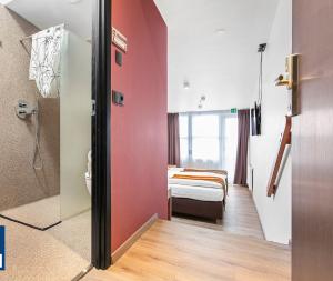 Voodi või voodid majutusasutuse Hotel Duus by Keflavik Airport toas
