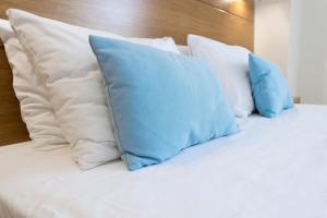 A bed or beds in a room at Villa Vasilis