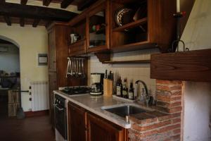 Kuchyň nebo kuchyňský kout v ubytování Casa Patrizia