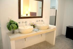 Koupelna v ubytování Hotel Mejorada Merida