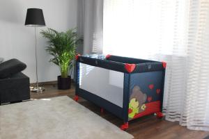 a childs toy television in a living room at Apartament Weronika in Gryfów Śląski +17 photos