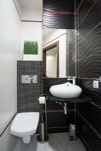 Łazienka w obiekcie Apartamenty Comfort & Spa Stara Polana VIPAPARTAMENTY