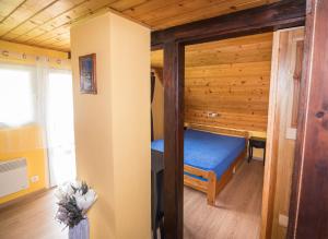 Letto o letti in una camera di Chata Hansenka