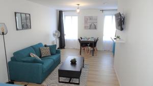 Χώρος καθιστικού στο Appartement cosy proche gare