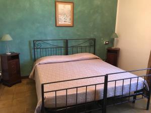 Cama o camas de una habitación en Il Biancospino