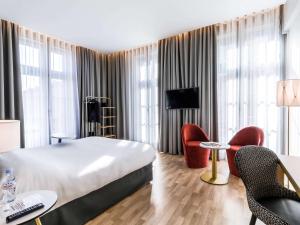 Un ou plusieurs lits dans un hébergement de l'établissement Ibis Styles Toulouse Capitole