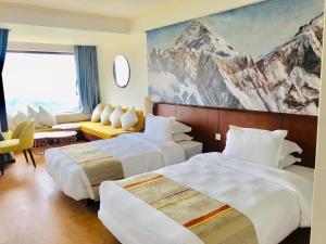 Llit o llits en una habitació de Hotel Annapurna View Sarangkot