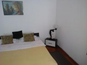 Postel nebo postele na pokoji v ubytování Smile Cluj
