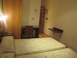 Postel nebo postele na pokoji v ubytování Hotel Totana Sur