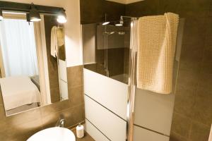 Koupelna v ubytování Donato Rooms
