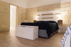 Postel nebo postele na pokoji v ubytování Donato Rooms