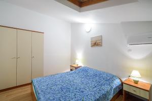 Postel nebo postele na pokoji v ubytování Studio Holiday Adriatic