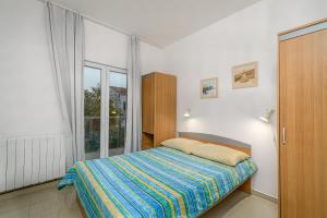 Postel nebo postele na pokoji v ubytování Studio Holiday Adriatic